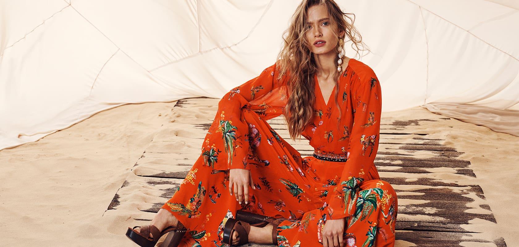 model wearing camilla red outfit