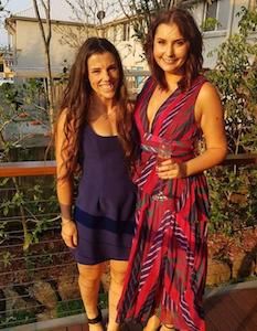 Gold Coast customer wearing a pink Talulah midi dress.